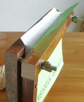 Book in binding clamp ready for gluing